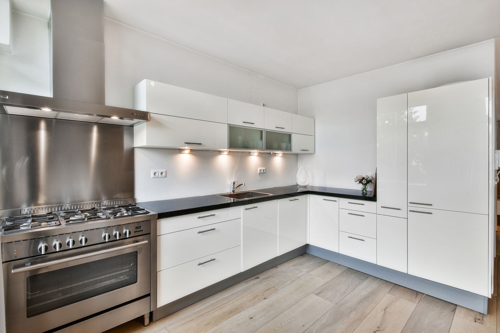 Bright white kitchen cabinet refinishing in Lakewood Ranch, Florida